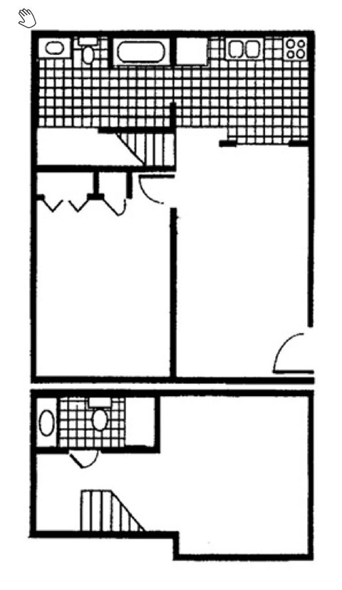 A black and white image of a floor plan with a grid pattern and a few rectangles.